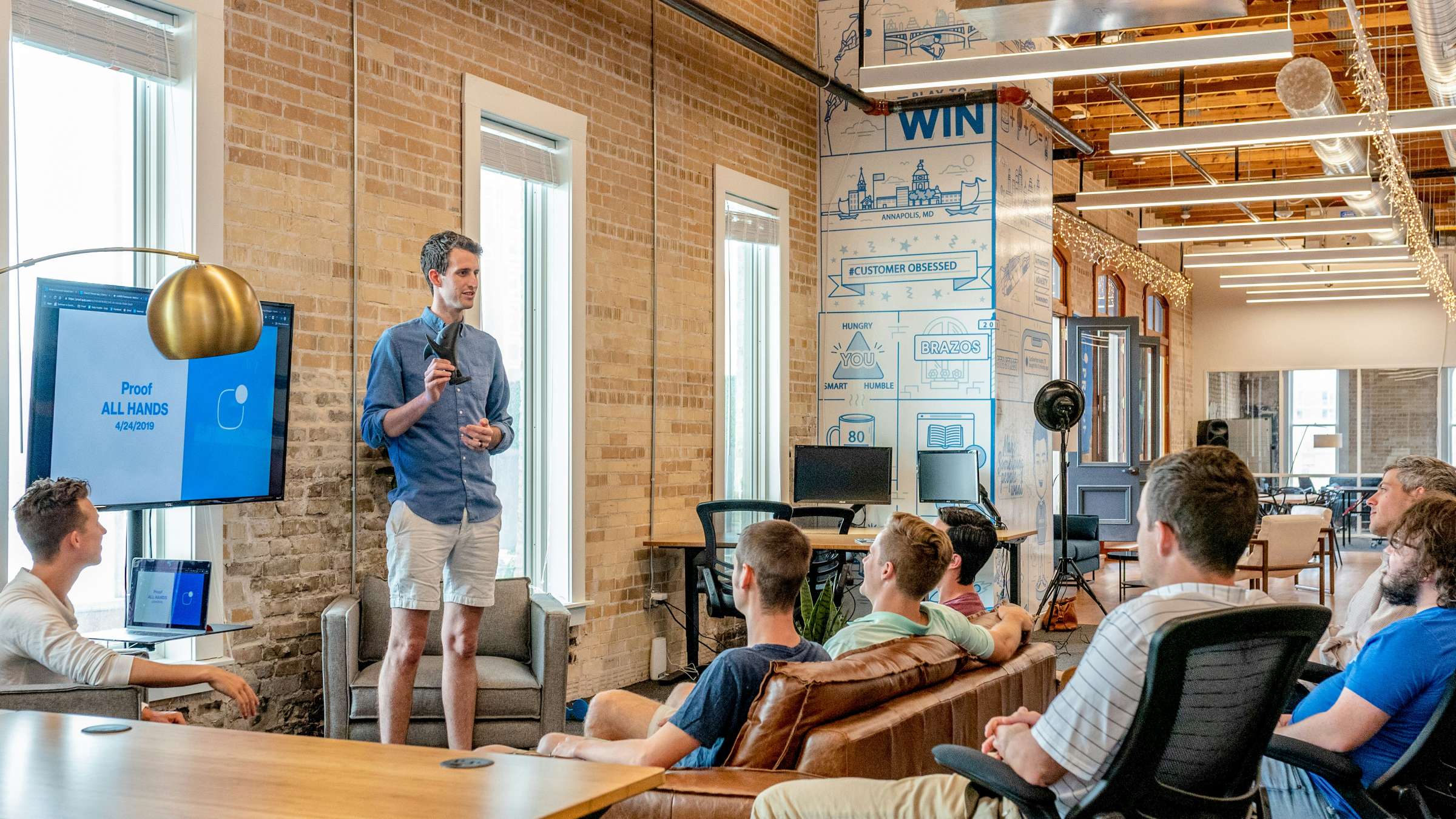 Man speaking to a small audience