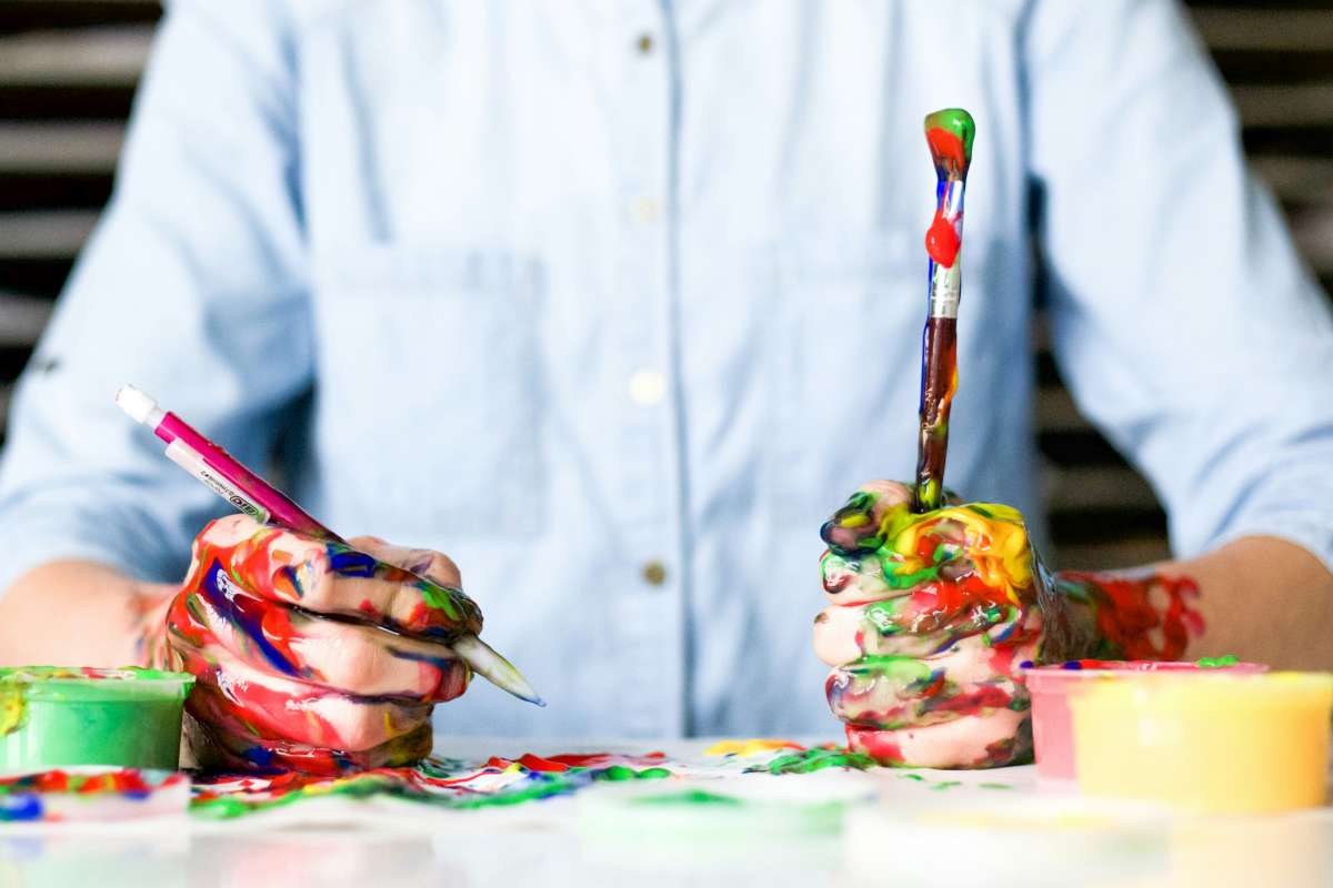 Man holds painted mess